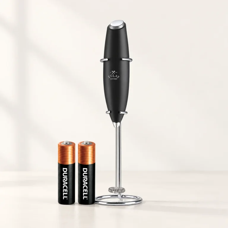 Black Zulay Milk Boss frother in its wire stand with two AA batteries