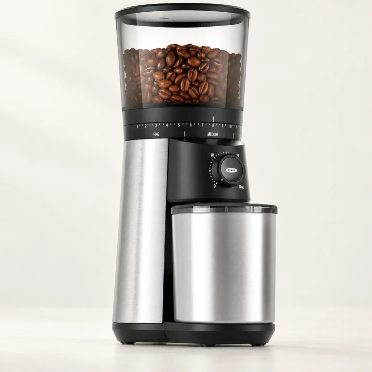 Silver OXO Brew conical burr grinder with a clear bean hopper, timer dial and steel grounds cup